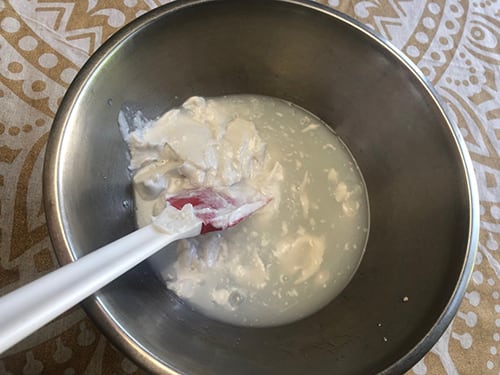 How to Make Stinging Nettle Shampoo For Hair Growth coconut milk in bowl step 1