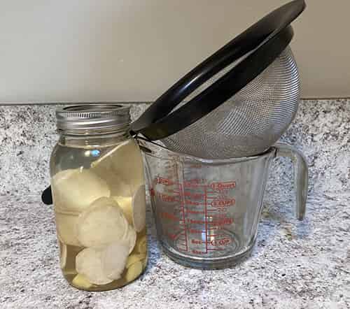 How to Make Horseradish Tincture- strain the tincture