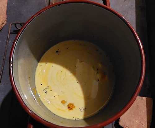 The Natural Booster Turmeric and Honey- place turmeric, milk and black pepper in a pot