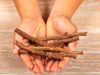 How to Make Alcohol-Free Tinctures - licorice root in hand