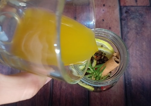 Homemade Winter Root Tonic - pour orange juice