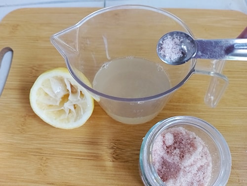 DIY Probiotic Fermented Apples- mix water, salt and lemon juice