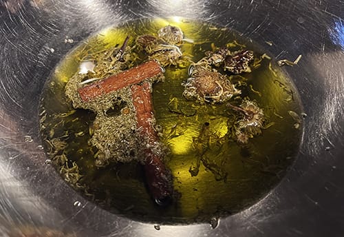 DIY Antifungal Oil Recipe - infuse herbs in olive oil
