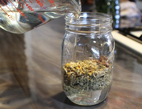 Homemade Lung Shield- pour the mixture over the herbs