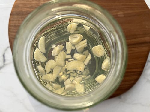 What Happens if You Soak Your Feet in Garlic Water- infuse the garlic