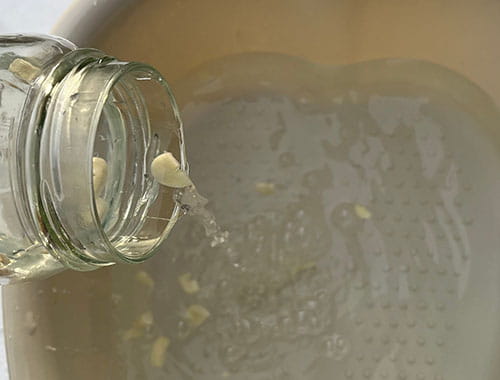 What Happens if You Soak Your Feet in Garlic Water- pour the infusion in your basin