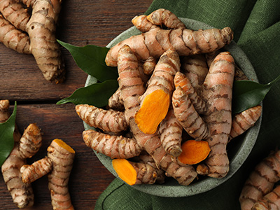 Fresh,Turmeric,Roots,On,Wooden,Table,,Flat,Lay