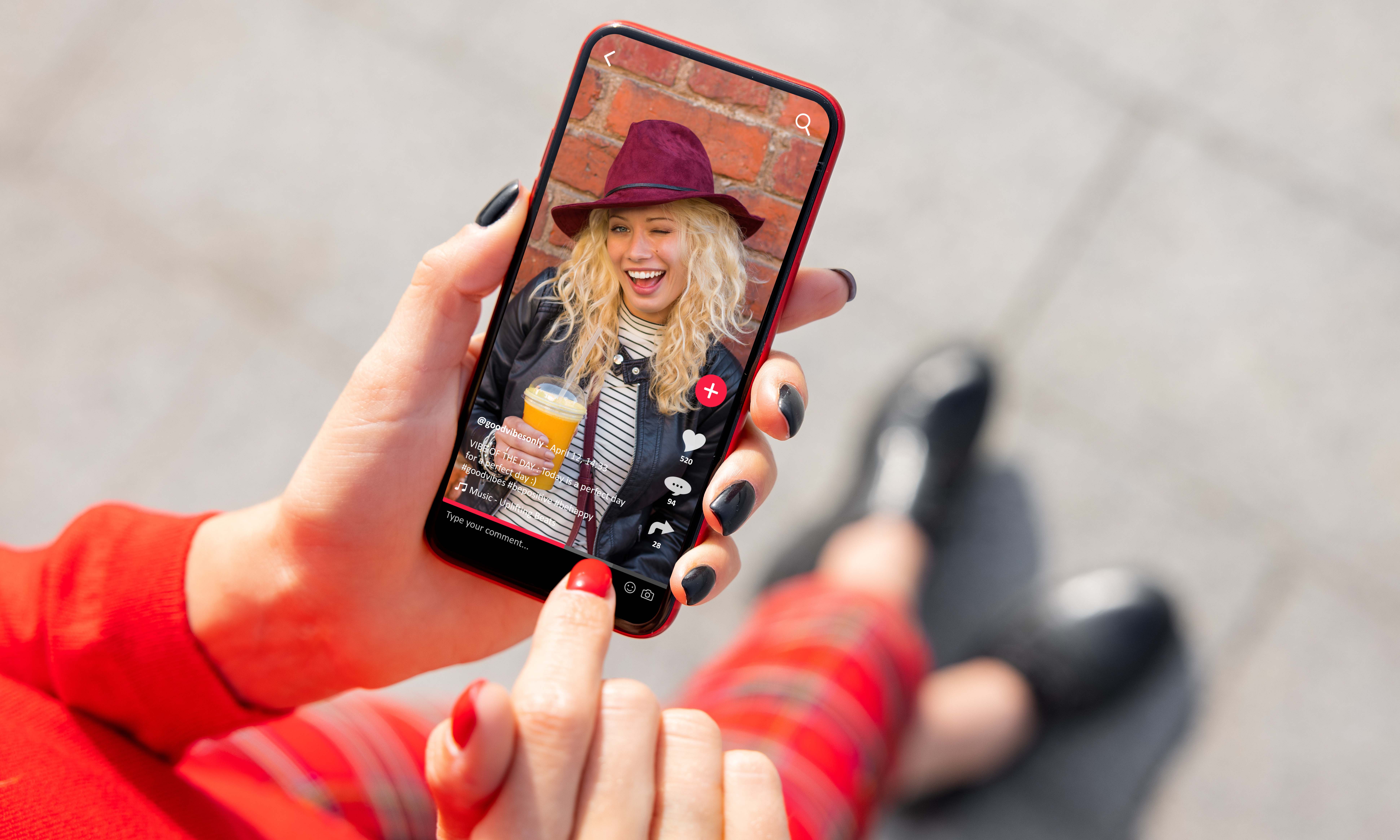 Woman viewing social media content on mobile phone