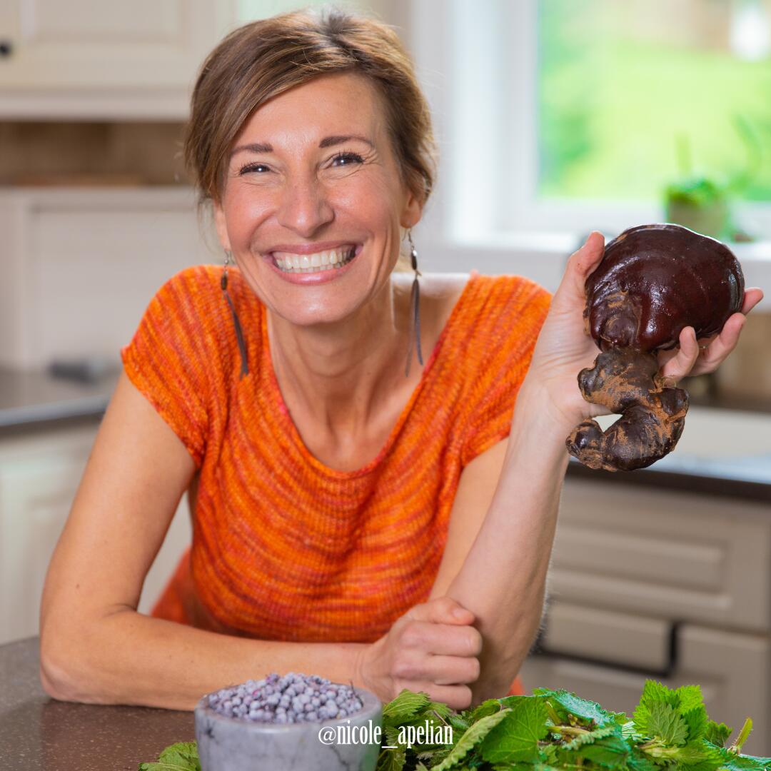 nicole holding reishi square