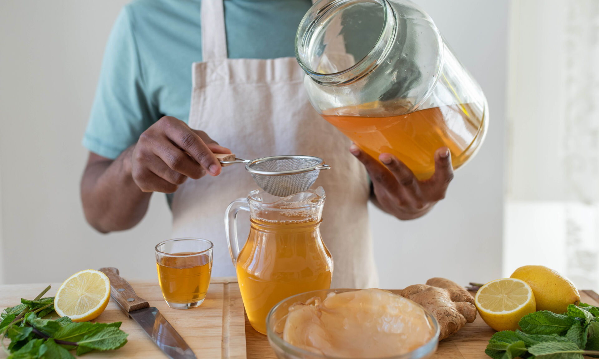 Making kombucha tea drink at home, fermented drink flavoured wit